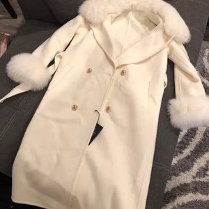 Woman’s fashion long faux fur coat
